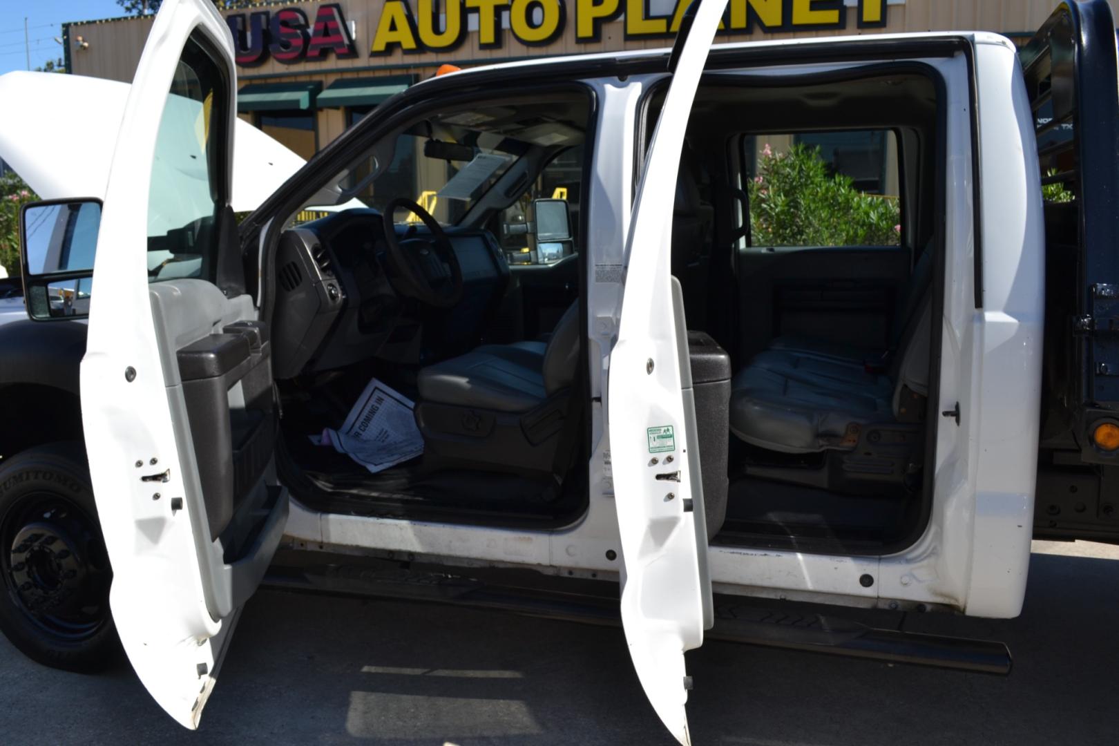 2013 WHITE Ford F550 with an POWERSTROKE 6.7L DIESEL engine, AUTOMATIC transmission, located at 9172 North Fwy, Houston, TX, 77037, (713) 910-6868, 29.887470, -95.411903 - CREW CAB, 11FT FLATBED, BUMPER PULL HITCH, 19,000LB GVWR , 4X4, POWER WINDOWS , LOCKS & MIRRORS, CRUISE CONTROL, COLD A/C - Photo#9